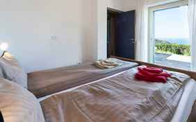 Ein weiteres Schlafzimmer im Casa Carlo mit schönstem Blick. 